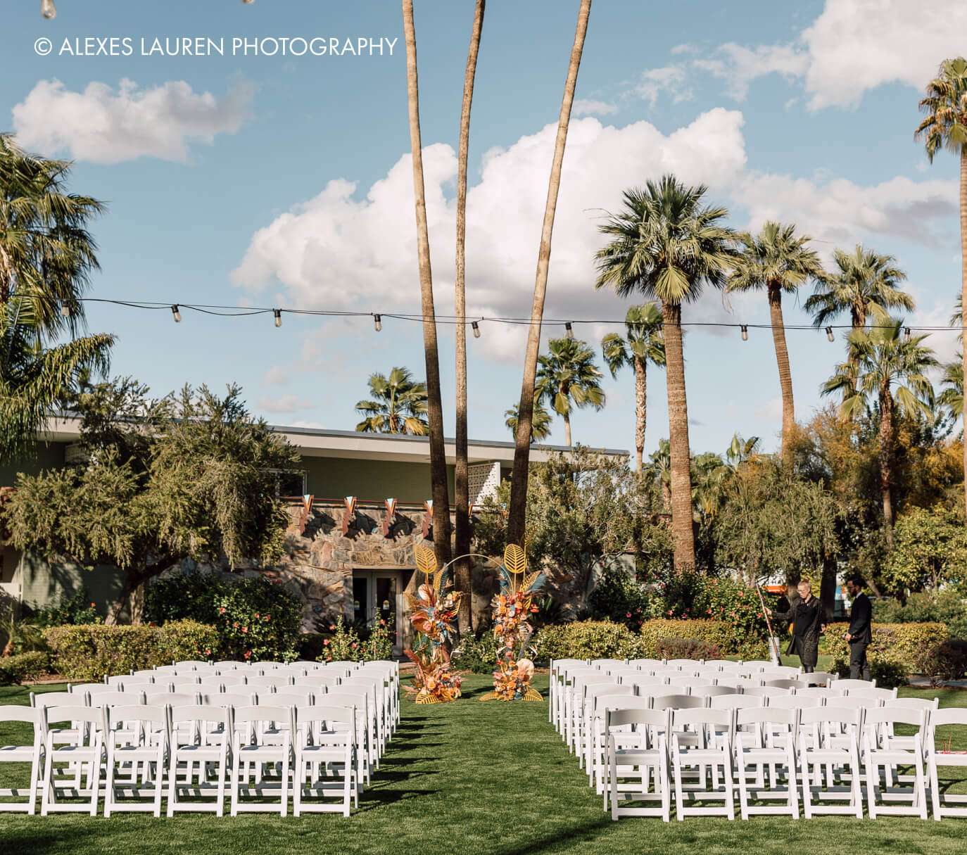 Romantic wedding scene outdoors.