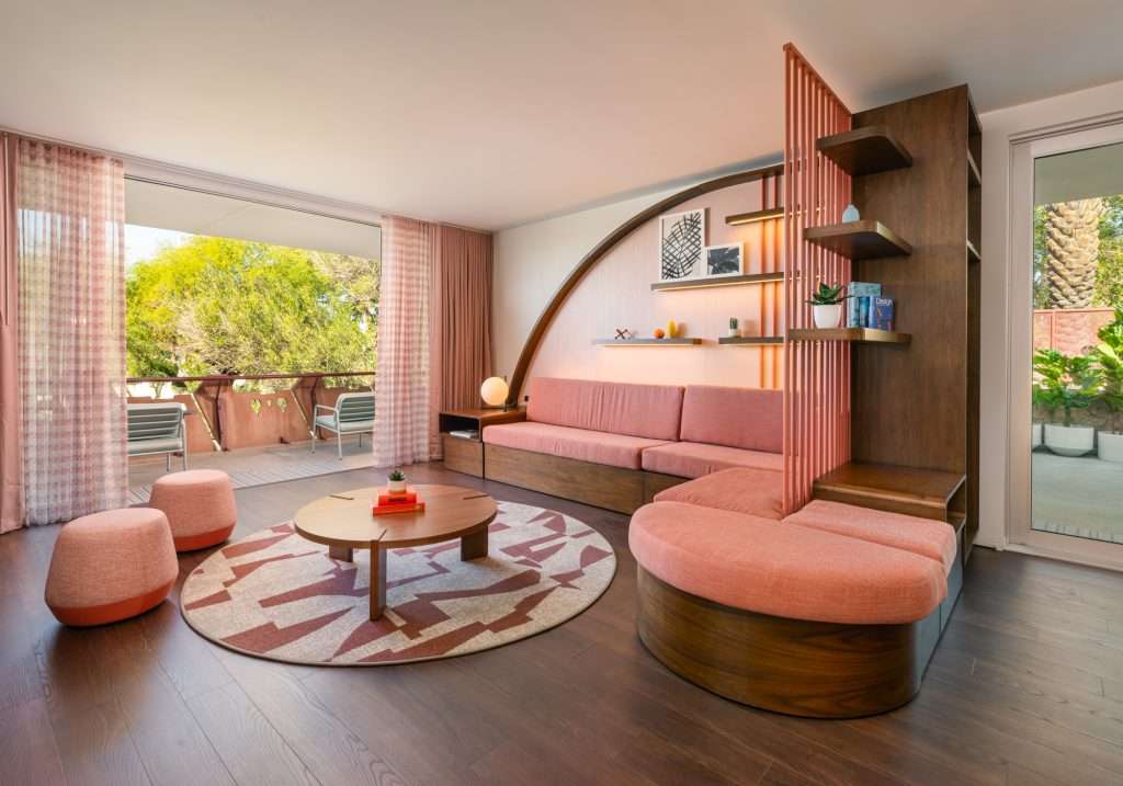 Hideaway Suite living room with sofa bed and mid-centruy modern elements