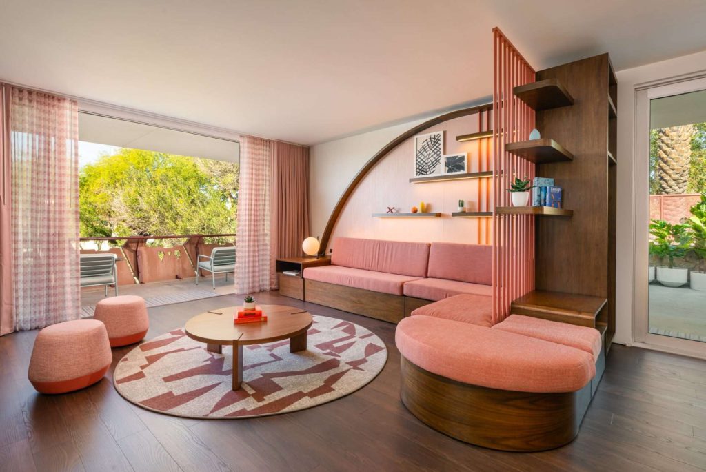 Hideaway Suite living room with sofa bed and mid-centruy modern elements