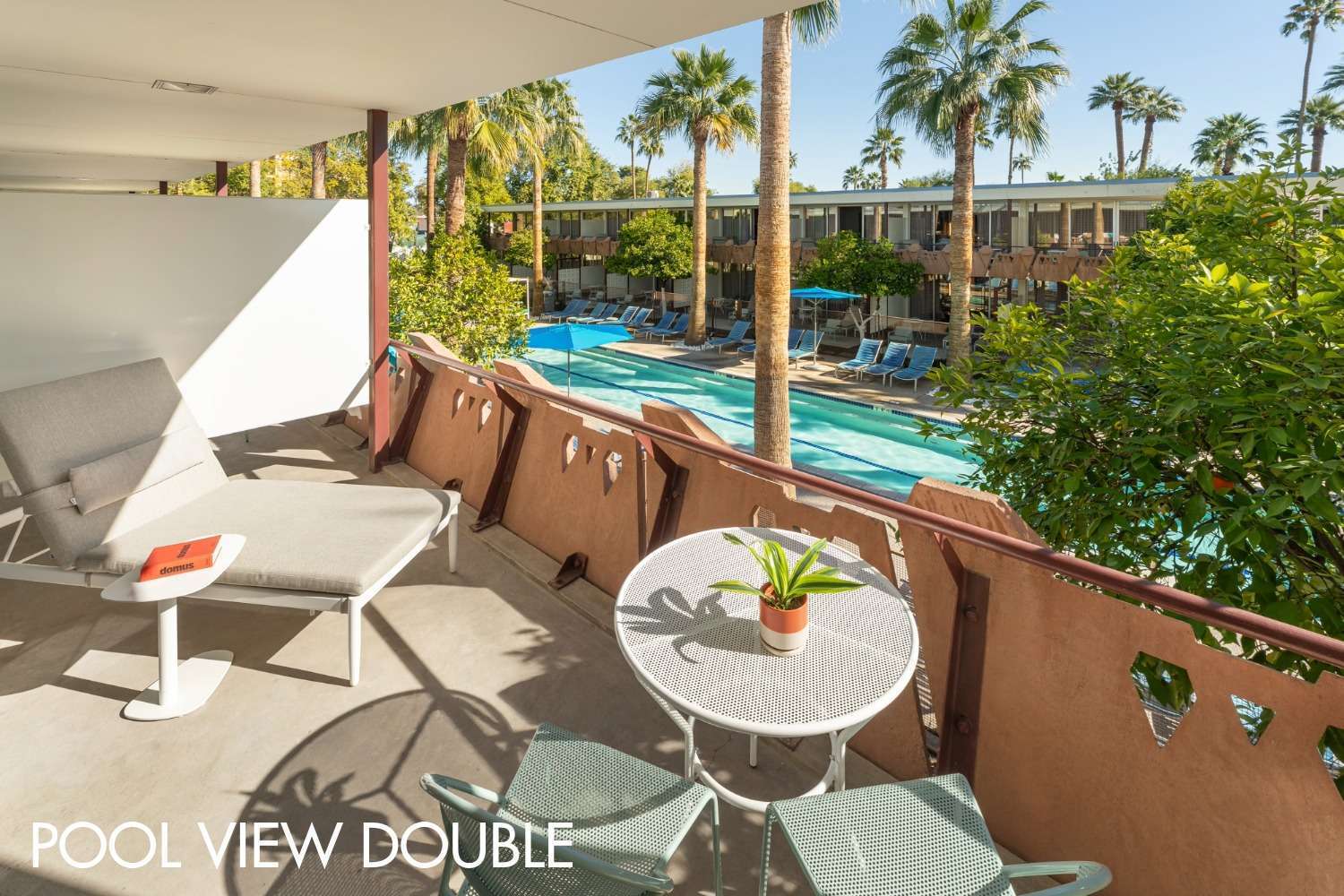 Pool View Double Guest Room Balcony with OHasis Pool in background