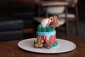 December Grand Finale dessert with festive holiday elements